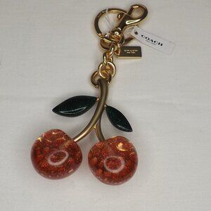 NWT - COACH 88547 Signature Cherry Bag Charm Gold/Pink Glitter